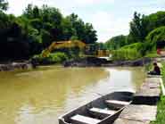 Removing western earth dam